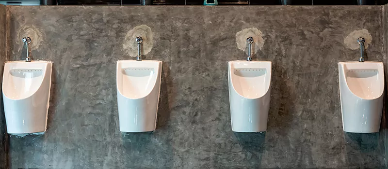 Wall-Mounted Urinal Installation in Liberty Village, Toronto